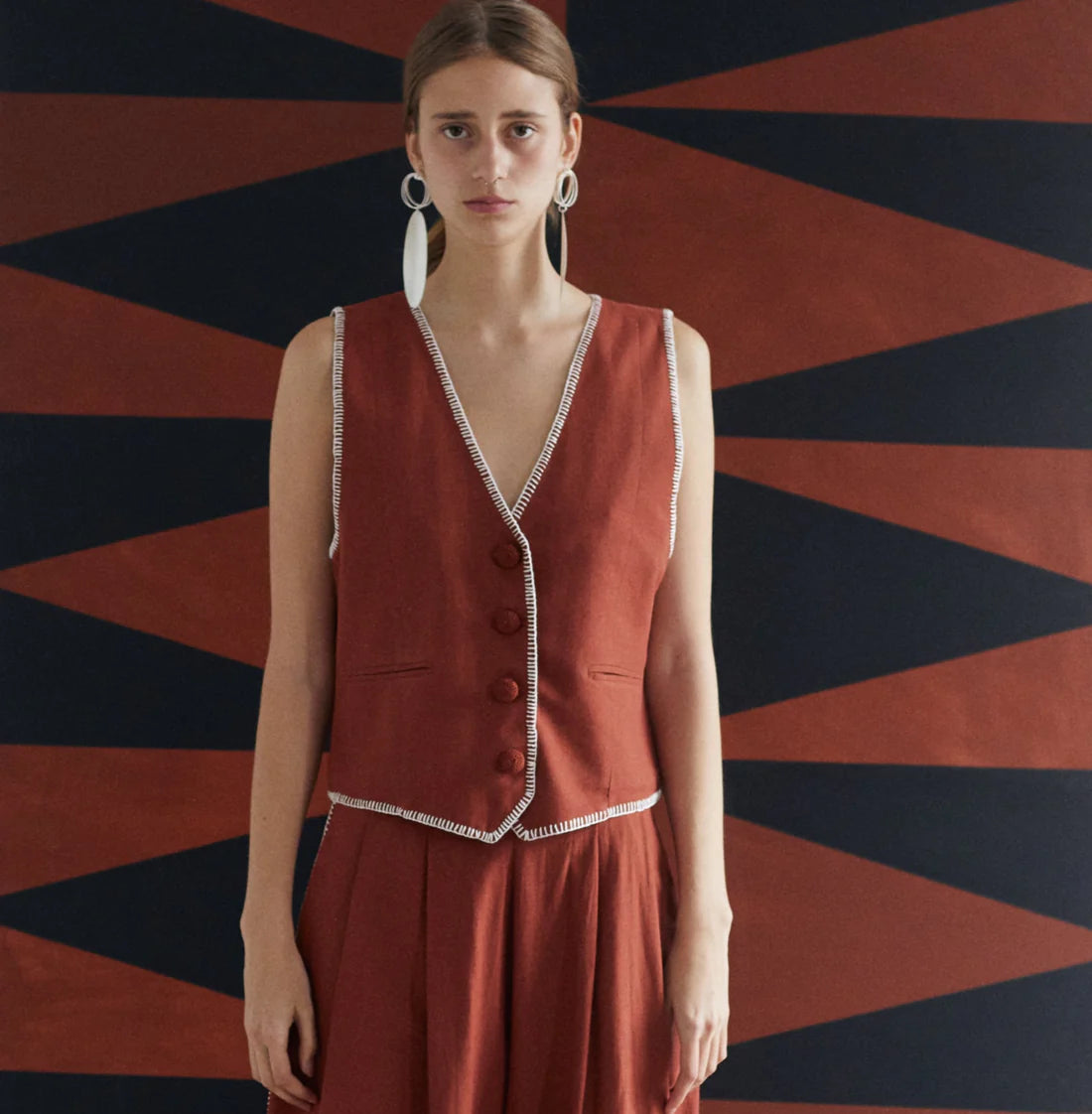 Amuleto Vest